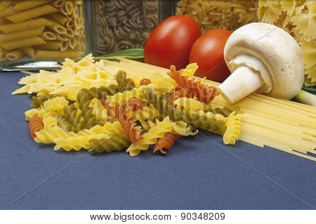 Various types of pasta on the table, homemade food preparation