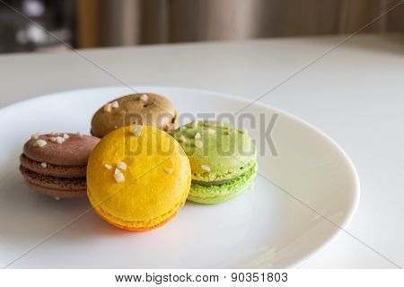 Orange, White, Brown Green Magaroon