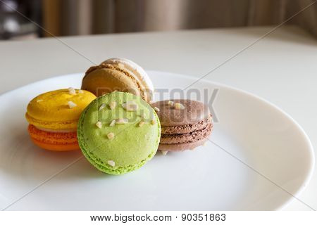 Orange, White, Brown Green Magaroon