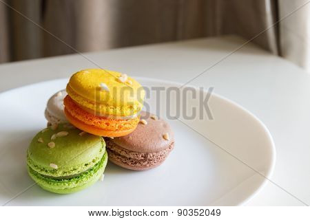 Orange, White, Brown Green Magaroon