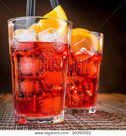 Spritz Aperitif Aperol Cocktail Glasses With Orange Slices And Ice Cubes