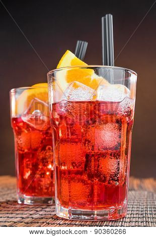 Spritz Aperitif Aperol Cocktail Glasses With Orange Slices And Ice Cubes