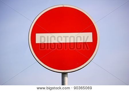 No entry for vehicles traffic sign against blue sky