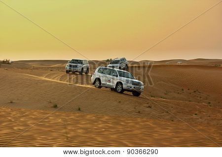 Driving on jeeps on the desert