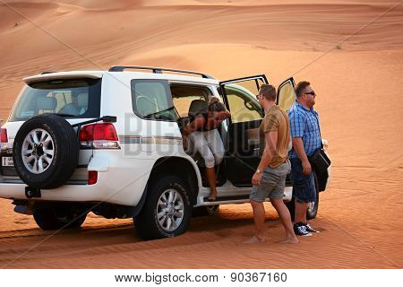 Driving on jeeps on the desert