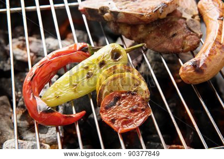 Vegetables Grilled And Sausages And Prok Chop On The Grill