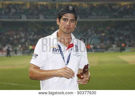 LONDON, ENGLAND - August 25: Alastair Cook with the Urn during the award ceremony  for the Investec Ashes cricket match between England and Australia played at The Kia Oval Cricket Ground 