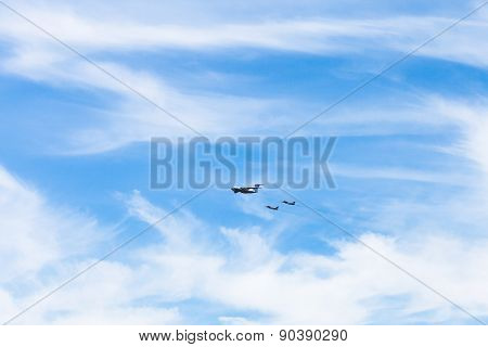 Air Refueling Of Fighter Airplanes In White Clouds