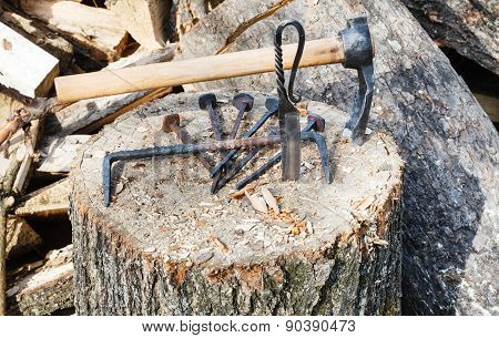 Hew Ax And Forged Hardware On Wooden Deck