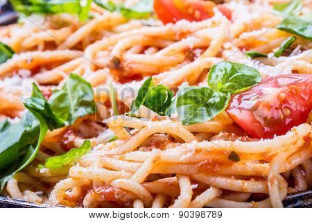 Spaghetti bolognese with cherry tomato and basil. Spaghetti with tomato sauce.