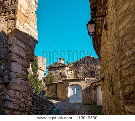 Empty Street Of La Roque-sur-cèze, It Is Very Picturesque Village On A Rocky Peak In Southern France