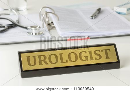 Name Plate On A Desk With The Engraving Urologist