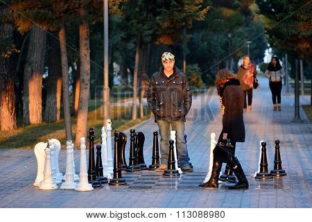 Couple playing street chess in Sumgait, Azerbaijan