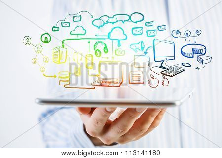 Hands of businessman demostrating tablet and network connection  concept