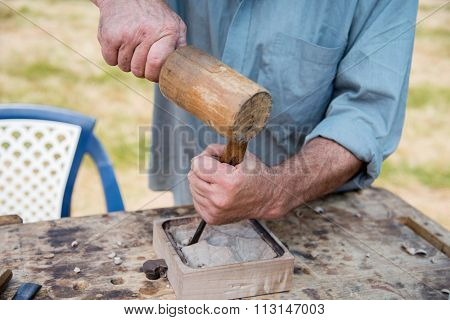 Old Woodcarver Working With Mallet And Chiesel, Vintage Style