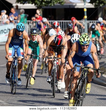 Large Group Of Cycling Triathlon Competitors Fighting