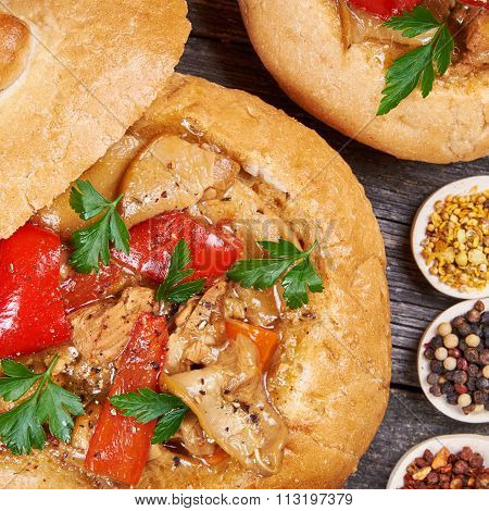 Stew Made From Meat, Vegetables And Mushrooms In A Bread Bowl
