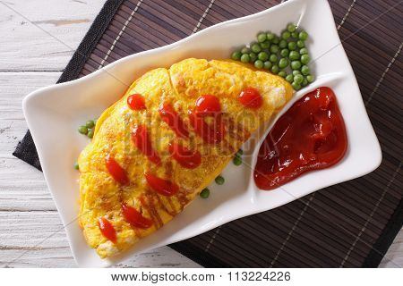 Omurice Omelet Stuffed With Rice Closeup. Horizontal Top View