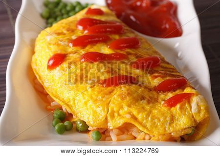 Delicious Omelette With Rice, Green Peas And Ketchup Close-up