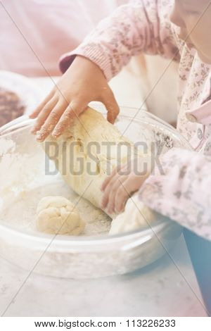 grandfather and granddaughter sifted flour