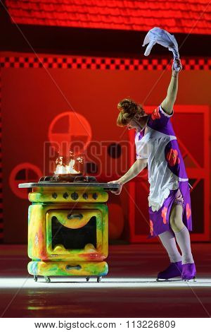 ST. PETERSBURG, RUSSIA - DECEMBER 29, 2015: Figure skater Alexey Tikhonov as Froken Bock in a scene of the New Year show Little Brother and Karlsson-on-the-Roof of Ilya Averbukh in the SC Yubileyniy