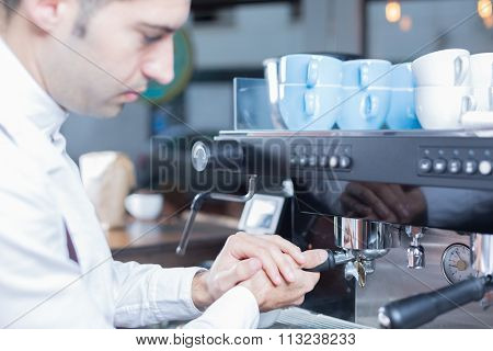 Side View Of Bartender Making Coffee