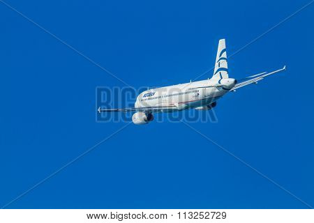 CORFU, GREECE - DECEMBER 12: An Aegean Airbus charter taking off on December 12, 2015 in Corfu,Aegean is an airline from Greece with its headquarters in Athens 