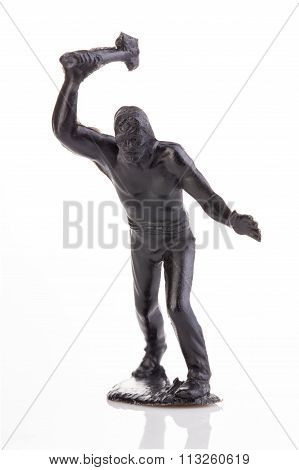 North American Indian With Tomahawk In His Hand Close-up Isolated On White . Miniature Figurine Of A