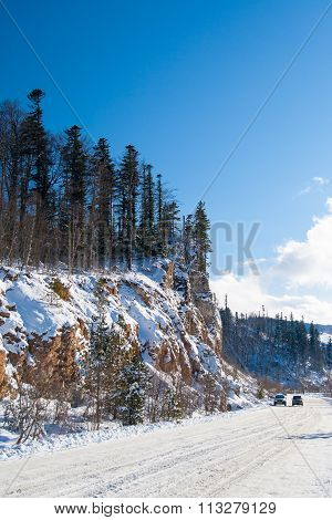 Cars Are On Winter Mountain Road In The Of Adygea