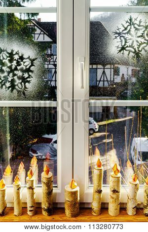 Handmade Wooden Candles As Window Christmas Decor
