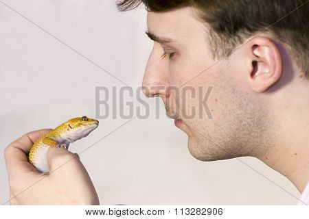 Men And Lizard Looking At Each Other