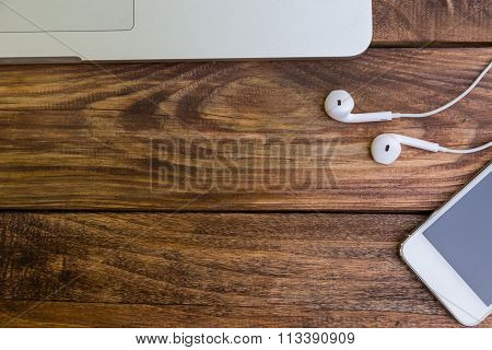 New high technology items on aged wooden desk