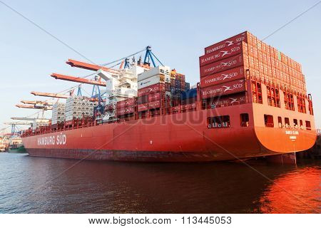 HAMBURG, GERMANY - MARCH 10: container ship Santa Clara of the Hamburg Sued shipping company in the Burchardkai on March 10, 2014. Burchardkai is the largest container terminal of the Hamurg port.