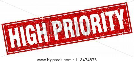 High Priority Red Square Grunge Stamp On White