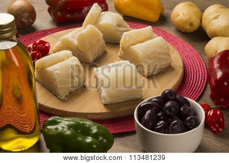 Salted Codfish On The Wooden Table With Ingredients