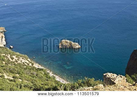 Sea landscape with rock in water recorded in place Fiolent in region Crimea on Black sea.