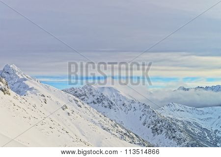Clouds Over Kasprowy Wierch Of Zakopane In Tatra Mounts In Winter