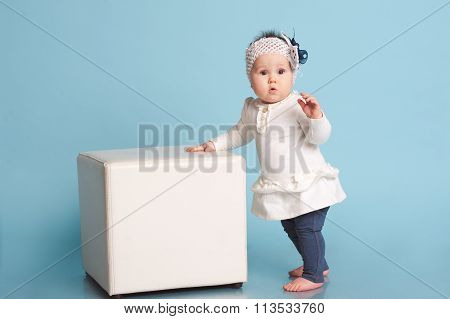 Child girl over blue