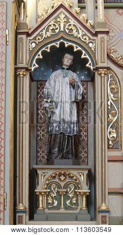 STITAR, CROATIA - AUGUST 27: St. Aloysius statue on altar of Our Lady of Lourdes in the church of Saint Matthew in Stitar, Croatia on August 27, 2015