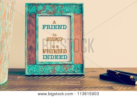 Motivational Quote Written On Vintage Photo Frame A Friend In Need Is A Friend Indeed