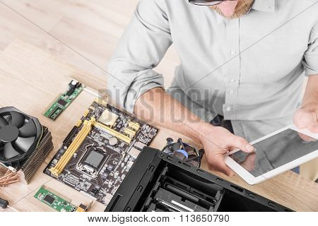 Computer repair professional.