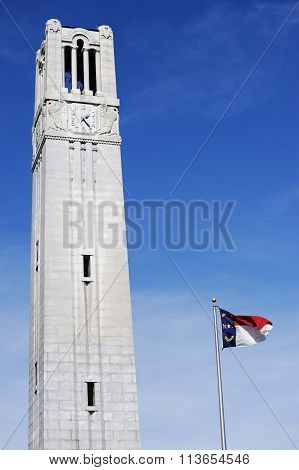 bell tower and North Carolina state flag
