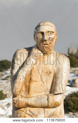Athens, Greece 02 January 2016. Thinking man wood carving at the park of lost souls (Parko Psychon)
