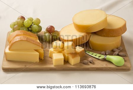 Italian Provolone On Wooden Board
