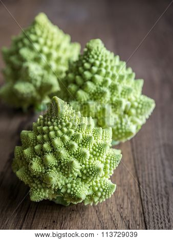 Fresh Romanesco Broccoli On The Wooden Board