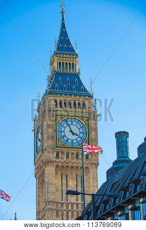 LONDON, UK - SEPTEMBER 10, 2015:  The Union Flag flying in front of the clock tower Big Ben, Palace