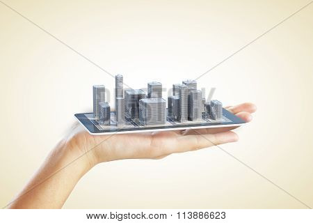 Hand Shows A Plan Of The Urban Area In The Cell Phone