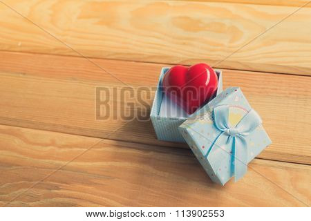 Gift Of Love. Hearty Gift. A Gift Box With A Red Heart Inside.