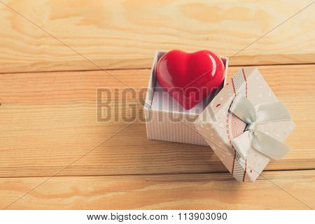 Gift Of Love. Hearty Gift. A Gift Box With A Red Heart Inside.