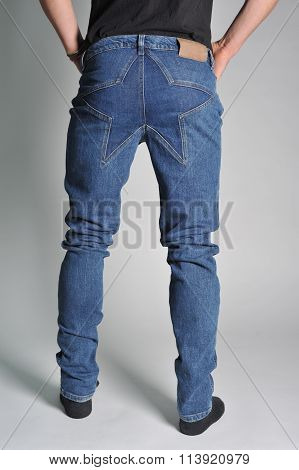 Youth jeans put on the guy